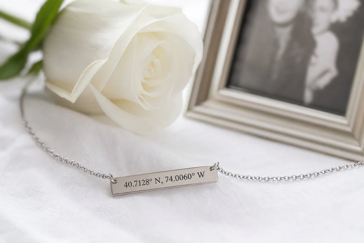 Memorial coordinates necklace with a white rose in soft, peaceful lighting