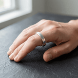 Coordinates Flat Band Ring - Ring on hand with engraved coordinates - lifestyle
