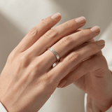 Coordinates flat band ring on hand - lifestyle shot