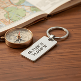 Coordinates Keychain - Engraved keychain on desk with compass - lifestyle